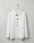 Camisa con apliques florales
